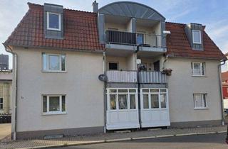 Wohnung kaufen in 98617 Meiningen, Vermietete 2-Zimmer-Dachgeschosswohnung mit Balkon und 2 Stellplätzen