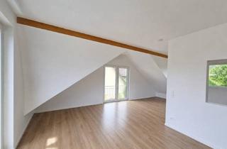 Wohnung kaufen in 61440 Oberursel, Neuwertige stilvolle Dachgeschosswohnung in Oberursel