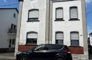 Einfamilienhaus kaufen in 56220 Kaltenengers, renovierungsbedürftiges Einfamilienhaus mit Stellplatz und kleinen Nebengebäuden in Kaltenengers