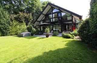 Villa kaufen in 27612 Loxstedt, Exklusives, idyllisches Architektenhaus in besonderer Bauweise, Traumgarten und 80 qm Garagenanlage