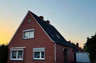 Einfamilienhaus kaufen in 26759 Hinte, Hinte - Gemütliches Einfamilienhaus mit Garage in ruhiger Lage
