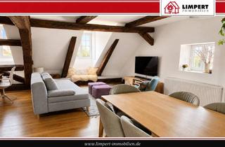 Wohnung kaufen in 91083 Baiersdorf, Historisches Wohnjuwel mit Loggia – moderne Maisonette in besonderem Ambiente
