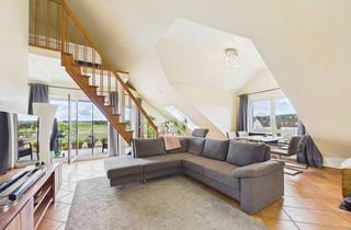 Wohnung kaufen in 65719 Hofheim am Taunus, Lichtdurchflutete Dachgeschosswohnung mit Süd-West-Balkon in Hofheim am Taunus