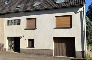 Einfamilienhaus kaufen in Kutzhofer Straße 2a, 66265 Heusweiler, Großzügiges Einfamilienhaus mit Garage und kleinem Garten