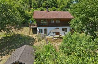 Haus kaufen in 64397 Modautal, Modautal-Webern: Idyllisches Blockhaus mit Einliegeroption auf großem Grundstück