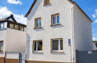 Einfamilienhaus kaufen in 65428 Rüsselsheim, Charmantes Einfamilienhaus mit Garten und Terrasse in zentrumsnaher Lage von Rüsselsheim
