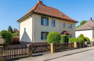 Doppelhaushälfte kaufen in Fichtestraße, 06766 Bitterfeld-Wolfen, Doppelhaushälfte mit ca. 119 m² Wohnfläche, Garage, Ausbaureserve und 586 m² großem Grundstück