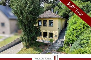 Einfamilienhaus kaufen in 52531 Übach-Palenberg, Freistehendes Einfamilienhaus mit weitläufigem Waldgrundstück, Dachterrasse und Garage in Frelenberg