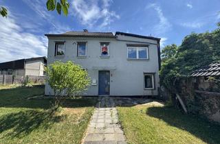 Einfamilienhaus kaufen in 41836 Hückelhoven, Freistehendes Einfamilienhaus mit Garten und großer Garage in zentraler Lage von Hückelhoven-Baal