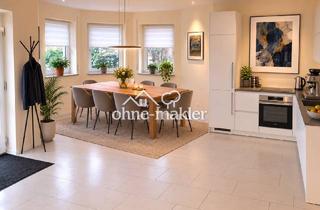 Wohnung kaufen in 88483 Burgrieden, Gemütliche Erdgeschosswohnung mit großem Wohnbereich, offener Küche und Garage