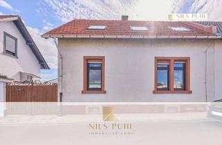 Einfamilienhaus kaufen in Brückenstraße, 67269 Grünstadt, Einfamilienhaus im Herzen von Grünstadt mit kleinem Garten, Garage und separatem Raum