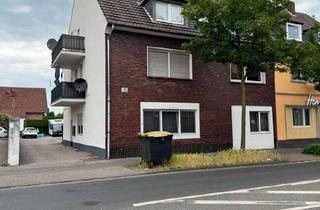 Anlageobjekt in 46537 Dinslaken, Gepflegtes und gut vermietetes Mehrfamilienhaus mit Garagen und Carports in Dinslaken-Bruch!