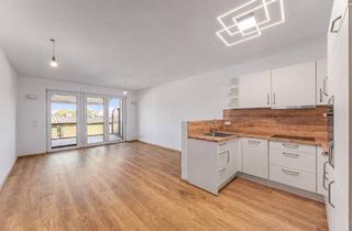 Wohnung kaufen in 84513 Töging, Modernes KfW-55-Apartment mit großzügiger Terrasse und hochwertiger Ausstattung – sofort bezugsfrei