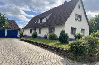 Einfamilienhaus kaufen in 74575 Schrozberg, Gepflegtes Wohnhaus mit 3 gemütlichen Wohnungen, 2 Garagen und großem Garten