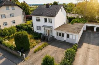 Einfamilienhaus kaufen in 64331 Weiterstadt, Freistehendes Einfamilienhaus in Weiterstadt - mit Wintergarten, Balkon und großzügiger Gartenfläche