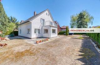 Haus kaufen in 12355 Berlin, IMMOBERLIN.DE - Großes Ein-/Zweifamilienhaus mit Südgarten in ruhiger Rudower Lage