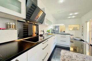 Wohnung kaufen in 41236 Rheydt, Sanierte Erdgeschosswohnung in zentraler Lage mit Doppelgarage, 2 Bädern, Küche und großer Terrasse