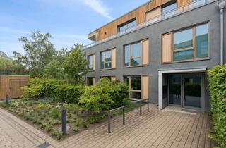 Wohnung kaufen in 30655 Groß Buchholz, Exklusive Erdgeschosswohnung mit Garten in bester Lage