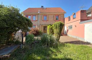 Haus kaufen in 63329 Egelsbach, 1-Familie-Wohnhaus mit eingewachsenem Garten und großer Dachterrasse in zentraler Lage, Egelsbach