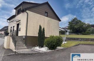 Einfamilienhaus kaufen in 57587 Birken-Honigsessen, Kompaktes Einfamilienhaus mit Nebengebäude und Einzelgarage in Ortslage