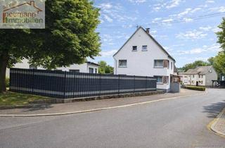Doppelhaushälfte kaufen in Härtlinger Str., 56459 Kaden, Familie + Hobby unter einem Dach: 4 Schlafmöglichkeiten, 2 Bäder & riesige Garage