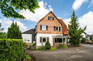 Einfamilienhaus kaufen in 53797 Lohmar, Handwerkertraum mit Potenzial Sanierungsbedürftiges Einfamilienhaus mit Gewerbeeinheit in Lohmar!