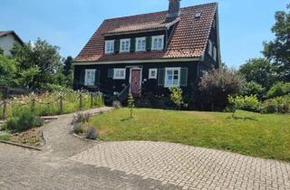 Einfamilienhaus kaufen in 34613 Schwalmstadt, Schwalmstadt - Hübsches Holzhaus mit Charakter in Ziegenhain