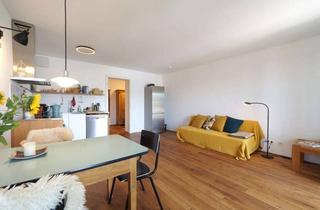 Wohnung kaufen in 83278 Traunstein, Stilvolle 64 m² 2-Zi.-Altstadtwohnung in kernsaniertem Altbau in zentraler Lage Traunsteins - Aufzug