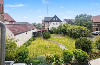 Einfamilienhaus kaufen in 35305 Grünberg, Grünberg-Lehnheim: Charmantes Einfamilienhaus mit großem Grundstück und Ausbaureserve