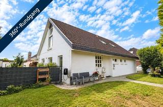 Haus kaufen in 21635 Jork, Zweifamilienhaus im Grünen mit Wintergarten
