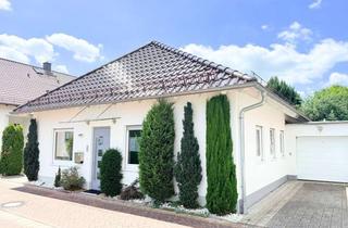 Haus kaufen in 64839 Münster, Moderner Bungalow mit traumhaftem Garten und Garage – Stilvolles Wohnen auf einer Ebene