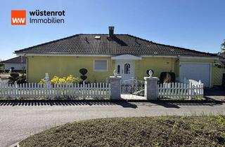 Haus kaufen in 88255 Baindt, Attraktiver Bungalow mit ELW, mediterranem Garten auf großem Grundstück