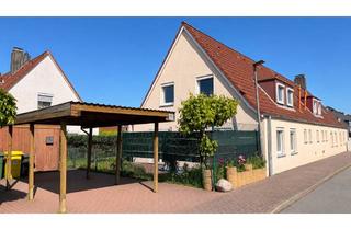 Haus kaufen in 25836 Garding, Ruhig wohnen, zentral leben – gepflegtes Reihenendhaus mit Carport, großem Garten und Terrasse