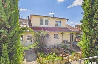 Wohnung kaufen in 71364 Winnenden, A+ Energieeffizienz, Schreinerküche und Garten: besondere 3-Zimmer-Wohnung am Waldrand