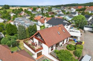 Einfamilienhaus kaufen in 35321 Laubach, Familienidyll in attraktiver Lage – Großzügiges Einfamilienhaus mit Fernblick in Laubach!