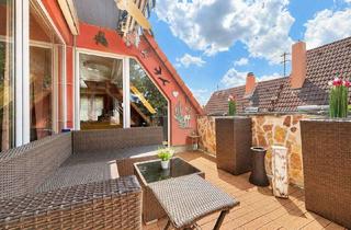 Wohnung kaufen in 76189 Daxlanden, Mediterranes Flair im Herzen von Daxlanden - Besondere Dachgeschosswohnung mit offenem Wohnkonzept