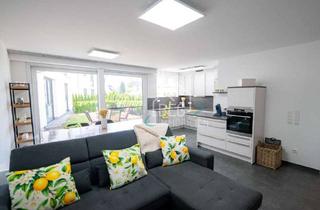 Wohnung kaufen in 73527 Schwäbisch Gmünd, Moderne Erdgeschosswohnung mit Gartenanteil und zwei Tiefgaragenstellplätzen