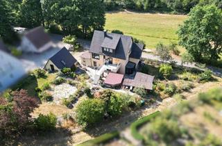 Einfamilienhaus kaufen in 90547 Stein, Charmantes Einfamilienhaus mit Einliegerwohnung auf traumhaftem 1.200 m² Grundstück – naturnah w