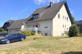 Haus kaufen in 55469 Budenbach, Großzügiges Zweifamilienhaus mit Einliegerwohnung in ruhiger Ortsrandlage - vielseitig nutzbar!