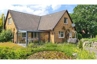 Einfamilienhaus kaufen in 26340 Zetel, Gepflegtes Einfamilienhaus mit Nebengebäude, Sommergarten, Kaminofen und Gartenteich
