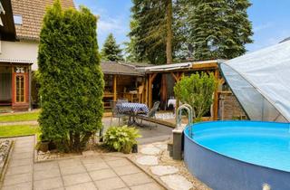 Haus kaufen in 09366 Stollberg, Sommerhaus im Grünen – mit Pool, Kamin und Carport