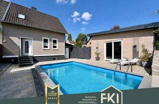 Doppelhaushälfte kaufen in 57584 Wallmenroth, **Modernisierte Doppelhaushälfte mit Garage und Pool in Wallmenroth**