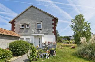 Doppelhaushälfte kaufen in 44892 Langendreer, Doppelhaushälfte mit zwei vermieteten Wohnungen und großem Grundstück