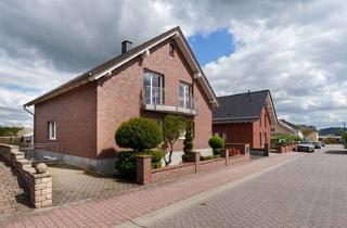 Einfamilienhaus kaufen in 56410 Montabaur, Hochwertiges Einfamilienhaus mit ELW und Garage in ruhiger Lage!