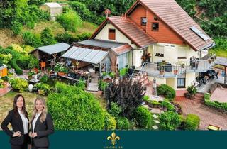 Einfamilienhaus kaufen in 66299 Friedrichsthal, Exklusives Einfamilienhaus mit Gartenparadies, Garage und Einliegerwohnung