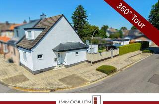 Einfamilienhaus kaufen in 52531 Übach-Palenberg, Gepflegtes Einfamilienhaus auf attraktivem Zweifrontengrundstück mit Garten und Garage
