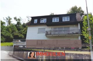Wohnung kaufen in 56659 Burgbrohl, 2 vermietete Familienwohnungen mit Garage – attraktives Investment im Dreifamilienhaus