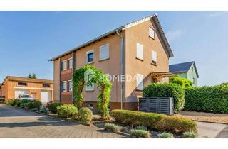 Anlageobjekt in 97359 Schwarzach, Modernisiertes Mehrfamilienhaus mit Garten, 2 Balkone und 5 Stellplätzen in Schwarzach am Main