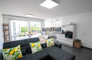 Wohnung kaufen in 73527 Schwäbisch Gmünd, Moderne Erdgeschosswohnung mit Gartenanteil und zwei Tiefgaragenstellplätzen