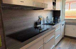 Wohnung kaufen in 35428 Langgöns, Langgöns - Helle 3-Zimmer-Wohnung mit Einbauküche